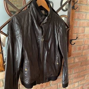 Women’s- barely worn, leather GUESS brand bomber jacket. Size extra large.